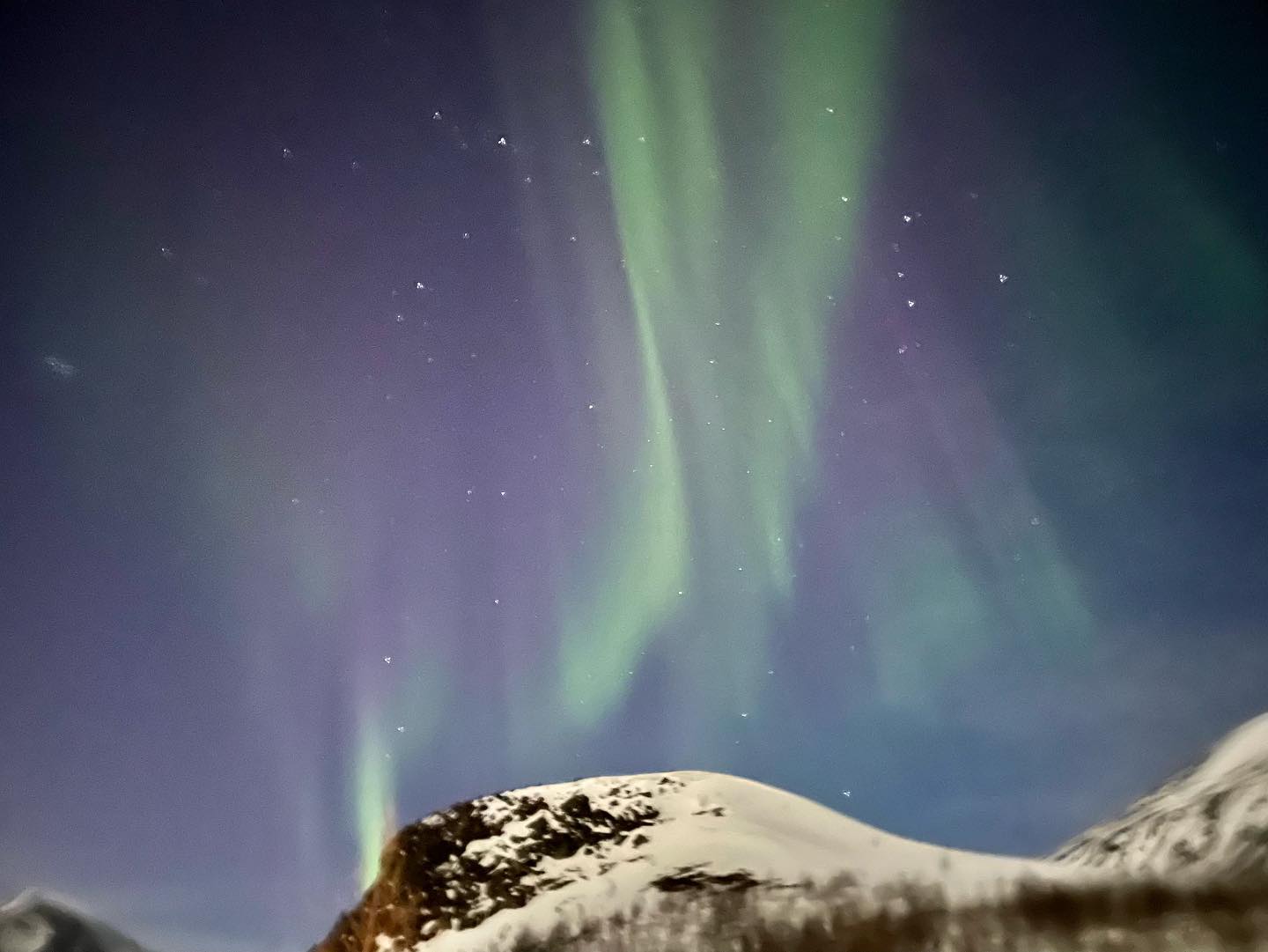 Green Fire Over Snow